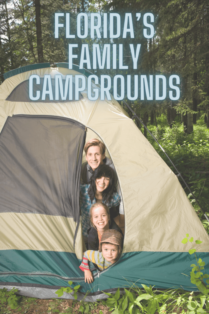 A smiling family of four peeks out from a beige and green tent in a sunlit forest, with the title 'Florida’s Family Campgrounds' overlaying the image in bold, transparent letters.